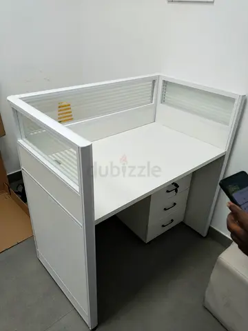 Single white office workstation cubicle with drawer unit