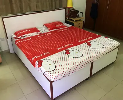 White wooden double bed with storage facility — good condition