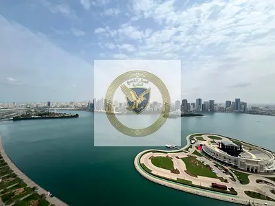Stunning sea view with a balcony overlooking Al Majaz Amphitheatre. Three-bedroom apartment with a spacious living room, including a master bedroom,