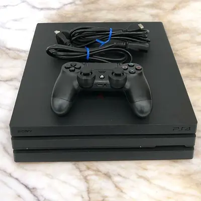 Sony PlayStation 4 Slim with DualShock 4 Controller and Cables - Good Condition