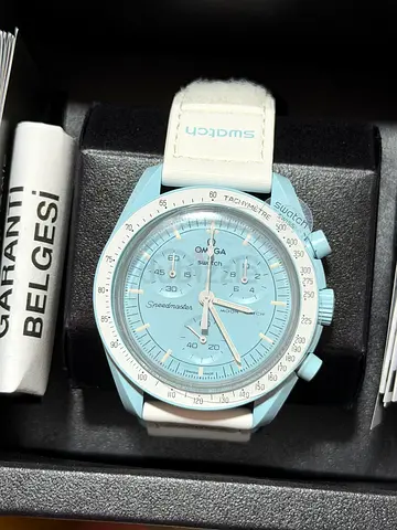 Omega swatch (mission to uranus) brand new with catalog and bill