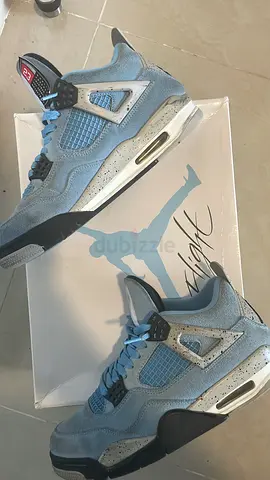 Air Jordan 4 Retro University Blue - Size ? (Lightly Used)