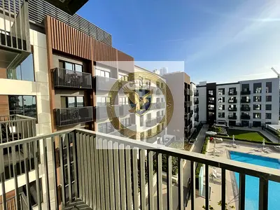 Apartment with balcony overlooking the swimming pool in Maryam Island. 1 bedroom + living room, with laundry room, free parking, gym, and swimming