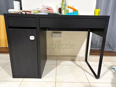Simple black study desk with storage cabinet and drawers