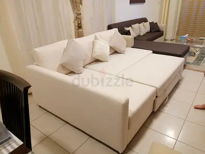 L-shaped Fabric Sofa Bed without Cushions - Good Condition