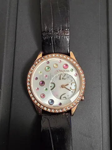 Equss Womens Fashion Crystal studded Bezel Wristwatch with Multicolor mother of pearl Dial Accents