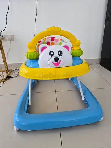 Adjustable height Walker with Toy Tray - Like new
