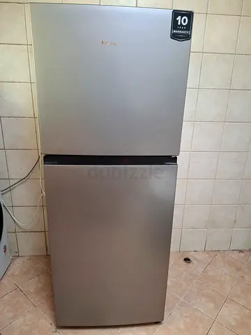 Hisense two-door refrigerator in good working condition.