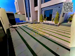 For sale, a luxury villa in a prime location in Al Alia Area Ajman, directly facing a main paved roa