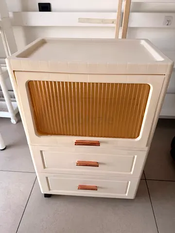 Compact Plastic Storage Cabinet with Roll-Top Drawer