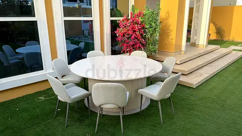 Round Outdoor Dining Table with 8 Upholstered Chairs - Marble Top