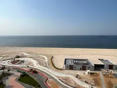 Two bedrooms, a living room, three bathrooms, a balcony with a sea view, built-in wardrobes, Ajman C