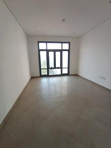 For annual rent in Sharjah, located in Al Qulayaah, a well-maintained one-bedroom apartment with a living room, ideal for individuals and small famili