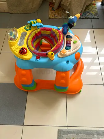 Baby activity jumper/exerciser with toys