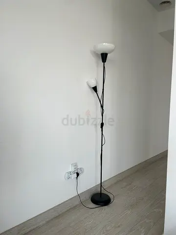 Tall black floor lamp with adjustable reading light includes wiz light bulbs