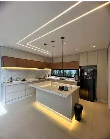Modern L-shaped Kitchen with Island and Integrated Lighting