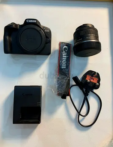Canon R50 EOS Mirrorless Camera with 18-45mm Lens + Charger  Strap