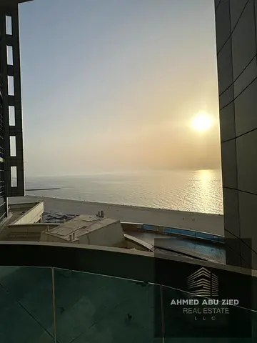 Furnished two-bedroom apartment in Corniche Tower Ajman, 75,000 annually, free air conditioning, gy