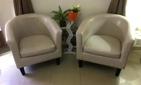 Pair of Beige Leather Tub Chairs — Good Condition