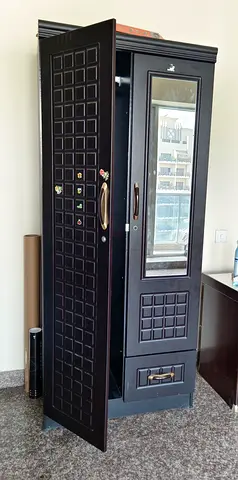 Single-door wooden wardrobe with mirror and drawer - dark finish