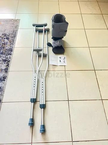Pair of adjustable underarm crutches with orthopedic boot (free)
