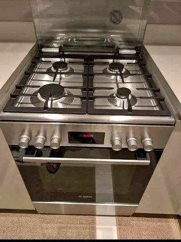 Bosch Stainless Steel 4-Burner Gas Cooker with Oven - Good Condition