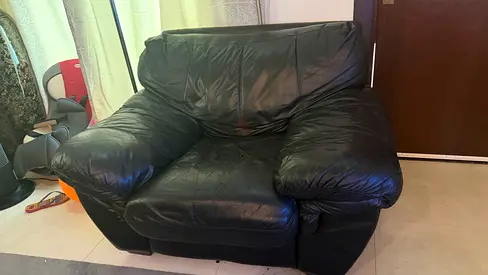 Used Large Black Leather Armchair - Comfortable Single Seater bought from homecenter- pure leather.