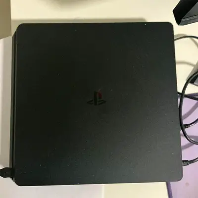 Used PS4 Slim - Very Good Condition - 500 GB - Comes With Two Games