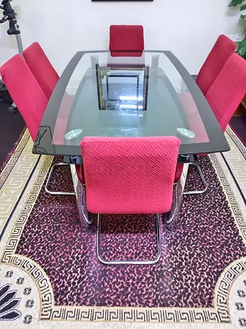 Glass Top Dining Table with 6 Red Upholstered Chairs