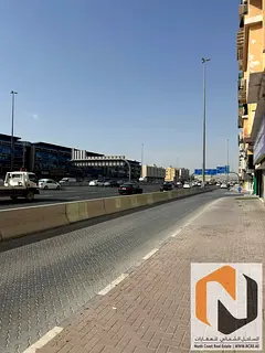 Building for Sale in Muwaileh – Prime Location on Main Road