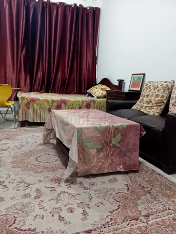 Spacious Master bedroom attached bath,c.ac, furnished for couples in Madina Zayed .