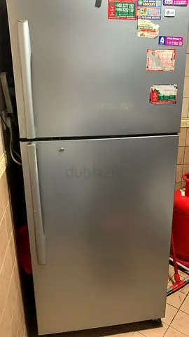 LG Silver double-door refrigerator in working condition
