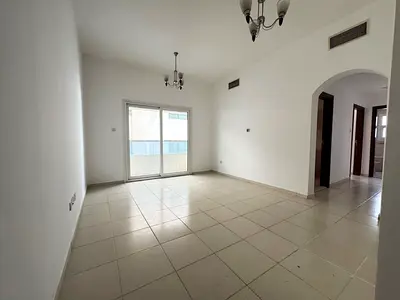 Luxury rooms and lounge for annual rent in Sharjah, Al Majaz 3 area | Sea view | Close to services | Central air conditioning | Two bathrooms | Securi