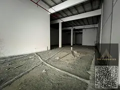 Commercial showroom for rent in the heart of Al Rashidiya, Ajman, on the main street, with a huge ar