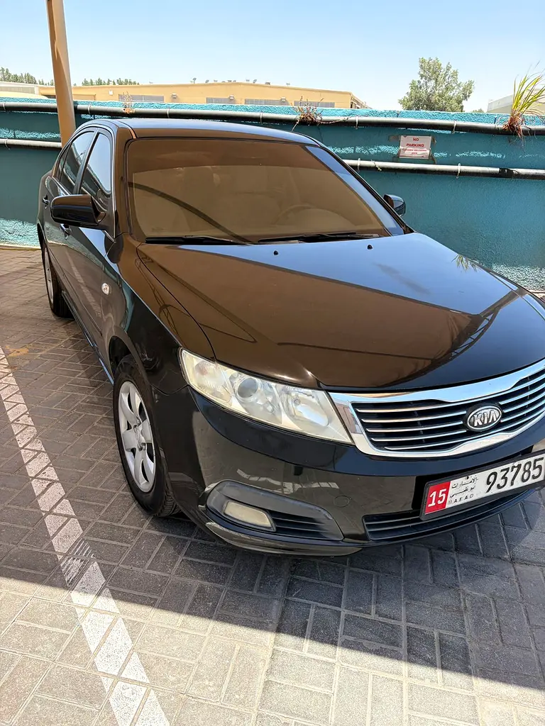 Kia Optima 2009 — photo 1 of 9