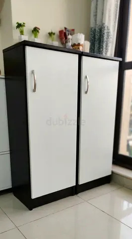 2 slim white storage cabinets with handles - good condition