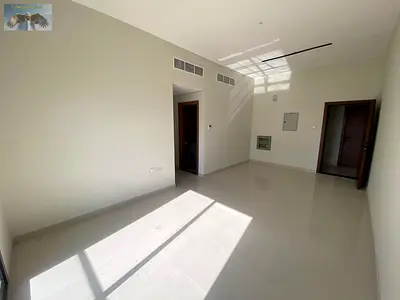 2BR apartment, second tenant, built-in wardrobes, spacious layout, super deluxe finishes, 1 month free, prime location near Dubai & Sharjah exit.