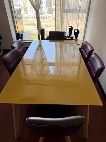 Modern yellow dining table with 6 upholstered chairs and matching book shelf- very high quality
