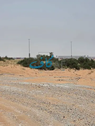 Prime commercial land for sale in Al-Malha, strategic location, approved for ground floor and four floors