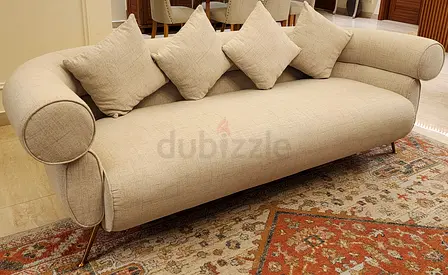 HomeCentre Modern Beige Fabric Sofa with Cylindrical Armrests (3-seater)