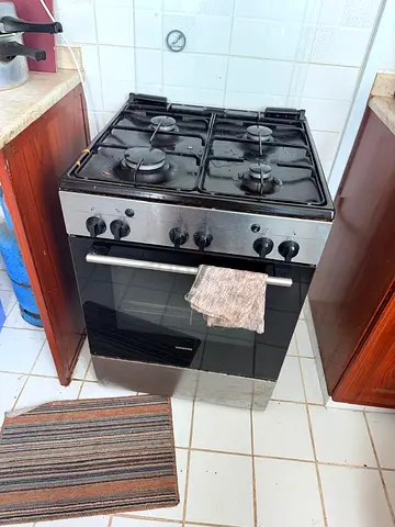 Used freestanding 4-burner gas stove with oven - reliable cooker
