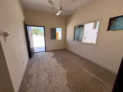 Lowest annual rent in Al Nuaimiya 2, Ajman. A spacious one-bedroom apartment with a large rooftop t