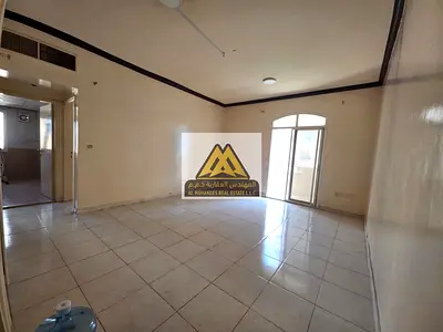 A 1-bedroom apartment with a living room for annual rent in Al Rashidiya 3 – Ajman. The apartment f
