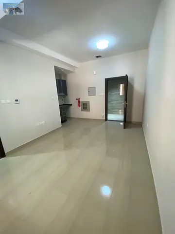 Studio apartment for annual rent in Ajman, first occupancy, 3 water heaters, central air conditioni