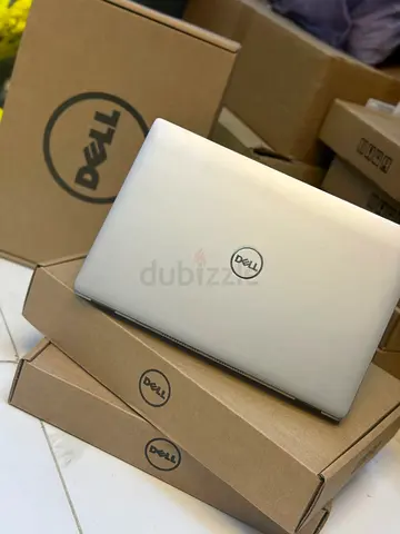 Dell latitude Silver Laptop - Good Condition, Comes with Original Box