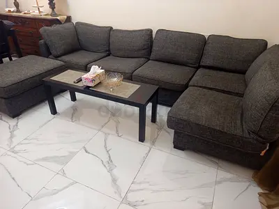 Dark Grey Fabric L-Shaped Sofa with Ottoman 6 setters with small sofa - Good Condition