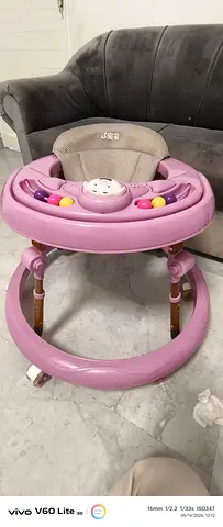 Used Pink Baby Walker with Toy Tray - Good Condition