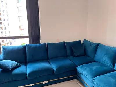 Teal velvet 7-seater sectional sofa in good condition