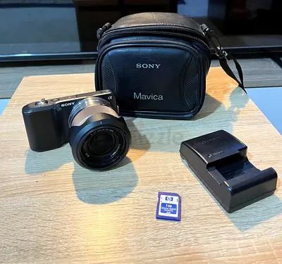 Sony NEX Mirrorless Camera with Lens, Charger, 1GB Card  Case (Used)