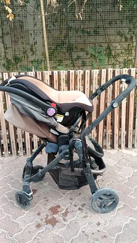 Used infant car seat with stroller frame (travel system) - beige